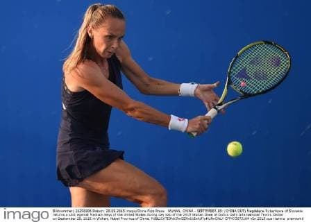 WUHAN, CHINA - SEPTEMBER 28: (CHINA OUT) Magdalena Rybarikova of Slovakia returns a shot against Madison Keys of the United States during day two of the 2015 Wuhan Open at Optics Vally International Tennis Center on September 28, 2015 in Wuhan, Hubei Province of China.  CFP473573164 