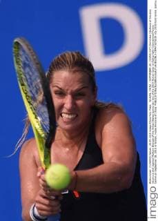 WUHAN, CHINA - SEPTEMBER 28: (CHINA OUT) Dominika Cibulkova of Slovakia returns a shot against Madison Brengle of the United States during day two of the 2015 Wuhan Open at Optics Vally International Tennis Center on September 28, 2015 in Wuhan, Hubei Province of China.  CFP473573239 