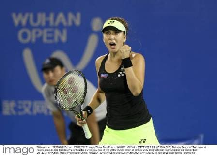 WUHAN, CHINA - SEPTEMBER 28: (CHINA OUT) Belinda Bencic of Switzerland reacts against Ajla Tomljanovic of Croatia during day two of the 2015 Wuhan Open at Optics Vally International Tennis Center on September 28, 2015 in Wuhan, Hubei Province of China.  CFP473573279 