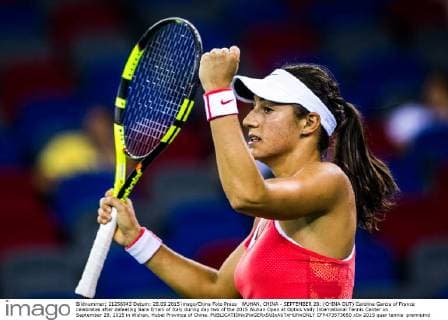 WUHAN, CHINA - SEPTEMBER 28: (CHINA OUT) Caroline Garcia of France celebrates after defeating Sara Errani of Italy during day two of the 2015 Wuhan Open at Optics Vally International Tennis Center on September 28, 2015 in Wuhan, Hubei Province of China.  CFP473573650 