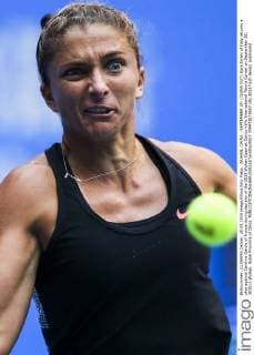 WUHAN, CHINA - SEPTEMBER 28: (CHINA OUT) Sara Errani of Italy returns a shot against Caroline Garcia of France during day two of the 2015 Wuhan Open at Optics Vally International Tennis Center on September 28, 2015 in Wuhan, Hubei Province of China.  CFP473573657 