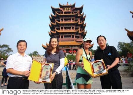 WUHAN, CHINA - SEPTEMBER 28: (CHINA OUT) Retired Chinese tennis star Li Na and Martina Hingis of Switzerland visit the Yellow Grane Tower during day two of the 2015 Wuhan Open on September 28, 2015 in Wuhan, Hubei Province of China.  CFP473573917 