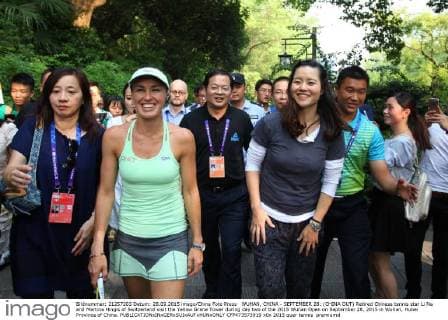 WUHAN, CHINA - SEPTEMBER 28: (CHINA OUT) Retired Chinese tennis star Li Na and Martina Hingis of Switzerland visit the Yellow Grane Tower during day two of the 2015 Wuhan Open on September 28, 2015 in Wuhan, Hubei Province of China.  CFP473573919 