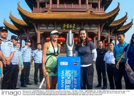 WUHAN, CHINA - SEPTEMBER 28: (CHINA OUT) Retired Chinese tennis star Li Na and Martina Hingis of Switzerland visit the Yellow Grane Tower during day two of the 2015 Wuhan Open on September 28, 2015 in Wuhan, Hubei Province of China.  CFP473573933 