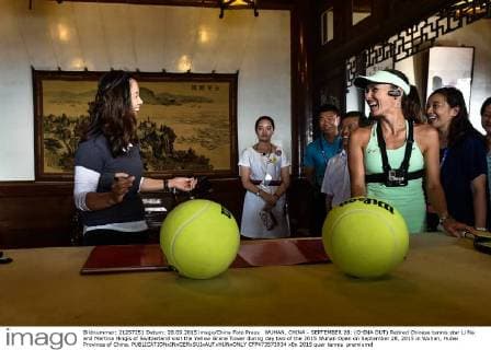 WUHAN, CHINA - SEPTEMBER 28: (CHINA OUT) Retired Chinese tennis star Li Na and Martina Hingis of Switzerland visit the Yellow Grane Tower during day two of the 2015 Wuhan Open on September 28, 2015 in Wuhan, Hubei Province of China.  CFP473573934 