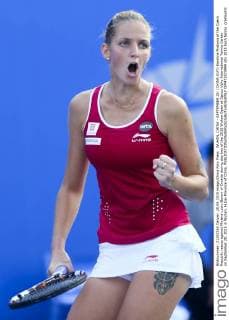WUHAN, CHINA - SEPTEMBER 28: (CHINA OUT) Karolina Pliskova of the Czech Republic reacts against Mirjana Lucic-Baroni of Croatia during day two of the 2015 Wuhan Open at Optics Vally International Tennis Center on September 28, 2015 in Wuhan, Hubei Province of China.  CFP473573949 
