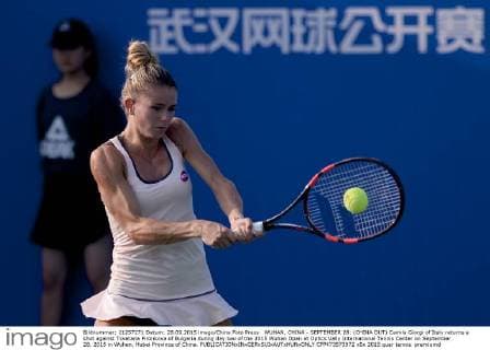WUHAN, CHINA - SEPTEMBER 28: (CHINA OUT) Camila Giorgi of Italy returns a shot against Tsvetana Pironkova of Bulgaria during day two of the 2015 Wuhan Open at Optics Vally International Tennis Center on September 28, 2015 in Wuhan, Hubei Province of China.  CFP473573972 