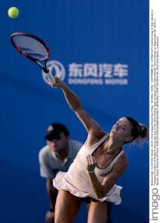 WUHAN, CHINA - SEPTEMBER 28: (CHINA OUT) Camila Giorgi of Italy serves to Tsvetana Pironkova of Bulgaria during day two of the 2015 Wuhan Open at Optics Vally International Tennis Center on September 28, 2015 in Wuhan, Hubei Province of China.  CFP473573974 