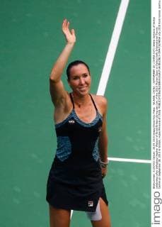 WUHAN, CHINA - SEPTEMBER 28: (CHINA OUT) Jelena Jankovic of Serbia celebrates after defeating Heather Watson of Great Britain during day two of the 2015 Wuhan Open at Optics Vally International Tennis Center on September 28, 2015 in Wuhan, Hubei Province of China.  CFP473574054 