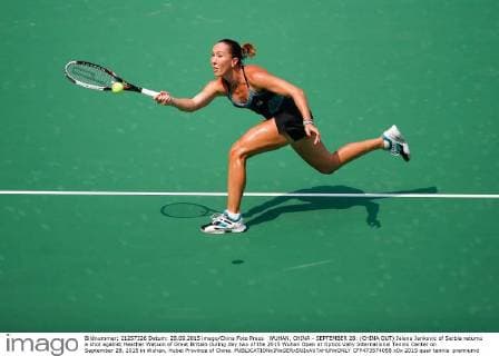 WUHAN, CHINA - SEPTEMBER 28: (CHINA OUT) Jelena Jankovic of Serbia returns a shot against Heather Watson of Great Britain during day two of the 2015 Wuhan Open at Optics Vally International Tennis Center on September 28, 2015 in Wuhan, Hubei Province of China.  CFP473574058 