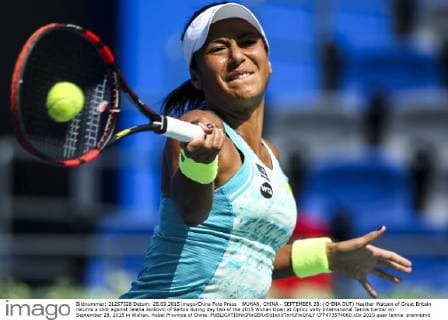 WUHAN, CHINA - SEPTEMBER 28: (CHINA OUT) Heather Watson of Great Britain returns a shot against Jelena Jankovic of Serbia during day two of the 2015 Wuhan Open at Optics Vally International Tennis Center on September 28, 2015 in Wuhan, Hubei Province of China.  CFP473574060 