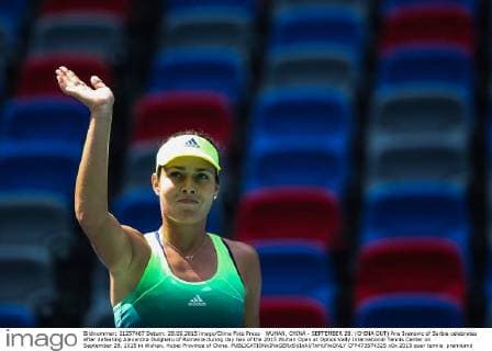WUHAN, CHINA - SEPTEMBER 28: (CHINA OUT) Ana Ivanovic of Serbia celebrates after defeating Alexandra Dulgheru of Romania during day two of the 2015 Wuhan Open at Optics Vally International Tennis Center on September 28, 2015 in Wuhan, Hubei Province of China.  CFP473574325 