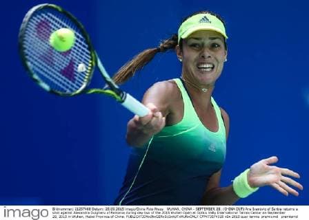 WUHAN, CHINA - SEPTEMBER 28: (CHINA OUT) Ana Ivanovic of Serbia returns a shot against Alexandra Dulgheru of Romania during day two of the 2015 Wuhan Open at Optics Vally International Tennis Center on September 28, 2015 in Wuhan, Hubei Province of China.  CFP473574326 