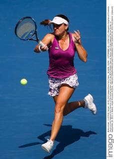 WUHAN, CHINA - SEPTEMBER 28: (CHINA OUT) Alexandra Dulgheru of Romania returns a shot against Ana Ivanovic of Serbia during day two of the 2015 Wuhan Open at Optics Vally International Tennis Center on September 28, 2015 in Wuhan, Hubei Province of China.  CFP473574335 