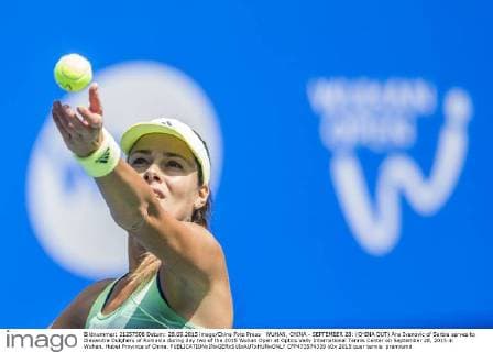 WUHAN, CHINA - SEPTEMBER 28: (CHINA OUT) Ana Ivanovic of Serbia serves to Alexandra Dulgheru of Romania during day two of the 2015 Wuhan Open at Optics Vally International Tennis Center on September 28, 2015 in Wuhan, Hubei Province of China.  CFP473574339 
