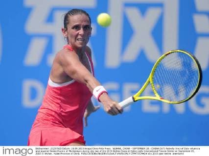 WUHAN, CHINA - SEPTEMBER 28: (CHINA OUT) Roberta Vinci of Italy returns a shot against Danka Kovinic of Montenegro during day two of the 2015 Wuhan Open at Optics Vally International Tennis Center on September 28, 2015 in Wuhan, Hubei Province of China.  CFP473574424 