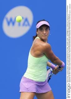WUHAN, CHINA - SEPTEMBER 28: (CHINA OUT) Danka Kovinic of Montenegro returns a shot against Roberta Vinci of Italy during day two of the 2015 Wuhan Open at Optics Vally International Tennis Center on September 28, 2015 in Wuhan, Hubei Province of China.  CFP473574427 