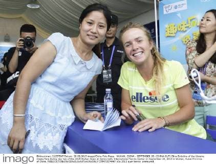 WUHAN, CHINA - SEPTEMBER 28: (CHINA OUT) Elina Svitolina of the Ukraine meets fans during day two of the 2015 Wuhan Open at Optics Vally International Tennis Center on September 28, 2015 in Wuhan, Hubei Province of China.  CFP473574447 