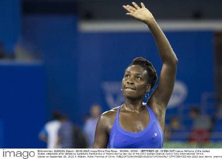 WUHAN, CHINA - SEPTEMBER 28: (CHINA OUT) Venus Williams of the United States celebrates after defeating Agnieszka Radwanska of Poland during day two of the 2015 Wuhan Open at Optics Vally International Tennis Center on September 28, 2015 in Wuhan, Hubei Province of China.  CFP473594303 