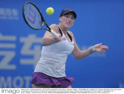 WUHAN, CHINA - SEPTEMBER 29: (CHINA OUT) Madison Brengle of America returns a shot against Ana Ivanovic of Serbia during day three of the 2015 Wuhan Open at Optics Vally International Tennis Center on September 29, 2015 in Wuhan, Hubei Province of China.  CFP473602698 