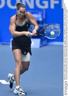 WUHAN, CHINA - SEPTEMBER 29: (CHINA OUT) Jelena Jankovic of Serbia returns a shot against Angelique Kerber of Germany during day three of the 2015 Wuhan Open at Optics Vally International Tennis Center on September 29, 2015 in Wuhan, Hubei Province of China.  CFP473602994 