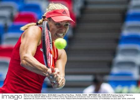WUHAN, CHINA - SEPTEMBER 29: (CHINA OUT) Angelique Kerber of Germany returns a shot against Jelena Jankovic of Serbia during day three of the 2015 Wuhan Open at Optics Vally International Tennis Center on September 29, 2015 in Wuhan, Hubei Province of China.  CFP473603006 