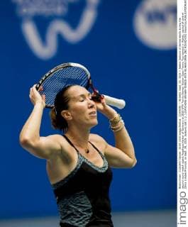 (150929) -- WUHAN, Sept. 29, 2015 -- Jelena Jankovic of Serbia reacts during the second round match againt Angelique Kerber of Germany at 2015 WTA Tennis Damen Wuhan Open Tennis Tournament in Wuhan, capital of central China s Hubei Province, on Sept. 29, 2015. Jankovic lost 1-2. ) (SP)CHINA-WUHAN-TENNIS-WTA-WUHAN OPEN-2ND ROUND(CN) XiaoxYijiu 