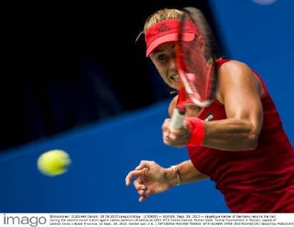 (150929) -- WUHAN, Sept. 29, 2015 -- Angelique Kerber of Germany returns the ball during the second round match againt Jelena Jankovic of Serbia at 2015 WTA Tennis Damen Wuhan Open Tennis Tournament in Wuhan, capital of central China s Hubei Province, on Sept. 29, 2015. Kerber won 2-1. ) (SP)CHINA-WUHAN-TENNIS-WTA-WUHAN OPEN-2ND ROUND(CN) XiaoxYijiu 