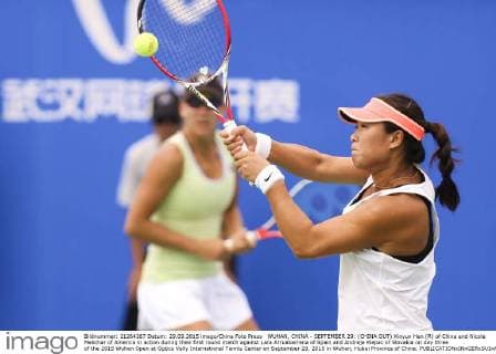 WUHAN, CHINA - SEPTEMBER 29: (CHINA OUT) Xinyun Han (R) of China and Nicole Melichar of America in action during their first round match against Lara Arruabarrena of Spain and Andreja Klepac of Slovakia on day three of the 2015 Wuhan Open at Optics Vally International Tennis Center on September 29, 2015 in Wuhan, Hubei Province of China.  CFP473605057 