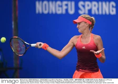 WUHAN, CHINA - SEPTEMBER 29: (CHINA OUT) Kristina Mladenovic of France returns a shot against Madison Keys of America during day three of the 2015 Wuhan Open at Optics Vally International Tennis Center on September 29, 2015 in Wuhan, Hubei Province of China.  CFP473606408 