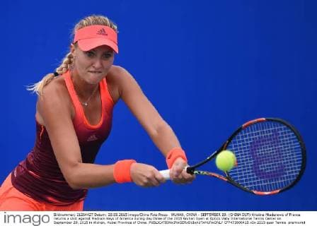 WUHAN, CHINA - SEPTEMBER 29: (CHINA OUT) Kristina Mladenovic of France returns a shot against Madison Keys of America during day three of the 2015 Wuhan Open at Optics Vally International Tennis Center on September 29, 2015 in Wuhan, Hubei Province of China.  CFP473606415 