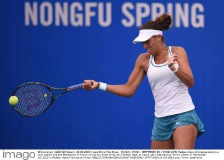 WUHAN, CHINA - SEPTEMBER 29: (CHINA OUT) Madison Keys of America returns a shot against Kristina Mladenovic of France during day three of the 2015 Wuhan Open at Optics Vally International Tennis Center on September 29, 2015 in Wuhan, Hubei Province of China.  CFP473606413 