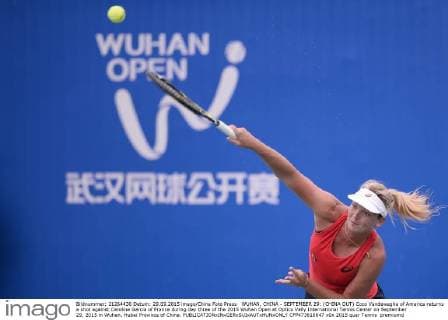 WUHAN, CHINA - SEPTEMBER 29: (CHINA OUT) Coco Vandeweghe of America returns a shot against Caroline Garcia of France during day three of the 2015 Wuhan Open at Optics Vally International Tennis Center on September 29, 2015 in Wuhan, Hubei Province of China.  CFP473610647 