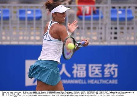 WUHAN, CHINA - SEPTEMBER 29: (CHINA OUT) Madison Keys of America returns a shot against Kristina Mladenovic of France during day three of the 2015 Wuhan Open at Optics Vally International Tennis Center on September 29, 2015 in Wuhan, Hubei Province of China.  CFP473606417 