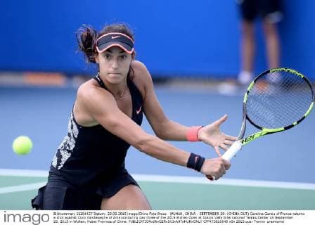 WUHAN, CHINA - SEPTEMBER 29: (CHINA OUT) Caroline Garcia of France returns a shot against Coco Vandeweghe of America during day three of the 2015 Wuhan Open at Optics Vally International Tennis Center on September 29, 2015 in Wuhan, Hubei Province of China.  CFP473610649 