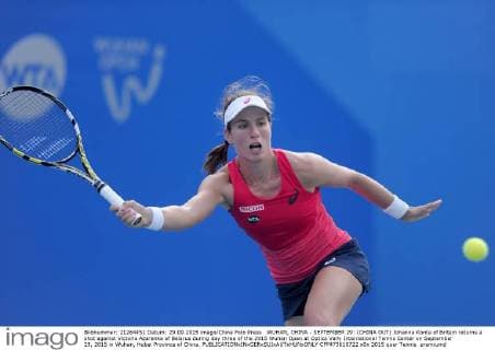 WUHAN, CHINA - SEPTEMBER 29: (CHINA OUT) Johanna Konta of Britain returns a shot against Victoria Azarenka of Belarus during day three of the 2015 Wuhan Open at Optics Vally International Tennis Center on September 29, 2015 in Wuhan, Hubei Province of China.  CFP473610722 