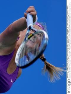 WUHAN, CHINA - SEPTEMBER 29: (CHINA OUT) Victoria Azarenka of Belarus returns a shot against Johanna Konta of Britain during day three of the 2015 Wuhan Open at Optics Vally International Tennis Center on September 29, 2015 in Wuhan, Hubei Province of China.  CFP473610723 