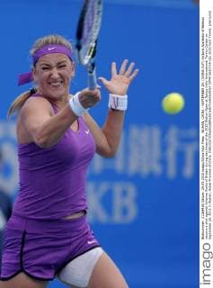 WUHAN, CHINA - SEPTEMBER 29: (CHINA OUT) Victoria Azarenka of Belarus returns a shot against Johanna Konta of Britain during day three of the 2015 Wuhan Open at Optics Vally International Tennis Center on September 29, 2015 in Wuhan, Hubei Province of China.  CFP473610724 