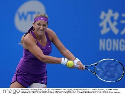 WUHAN, CHINA - SEPTEMBER 29: (CHINA OUT) Victoria Azarenka of Belarus returns a shot against Johanna Konta of Britain during day three of the 2015 Wuhan Open at Optics Vally International Tennis Center on September 29, 2015 in Wuhan, Hubei Province of China.  CFP473610725 
