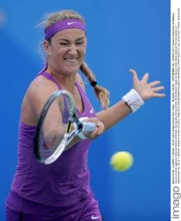 WUHAN, CHINA - SEPTEMBER 29: (CHINA OUT) Victoria Azarenka of Belarus returns a shot against Johanna Konta of Britain during day three of the 2015 Wuhan Open at Optics Vally International Tennis Center on September 29, 2015 in Wuhan, Hubei Province of China.  CFP473610727 