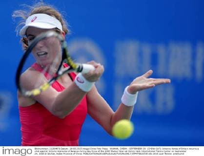 WUHAN, CHINA - SEPTEMBER 29: (CHINA OUT) Johanna Konta of Britain returns a shot against Victoria Azarenka of Belarus during day three of the 2015 Wuhan Open at Optics Vally International Tennis Center on September 29, 2015 in Wuhan, Hubei Province of China.  CFP473610730 