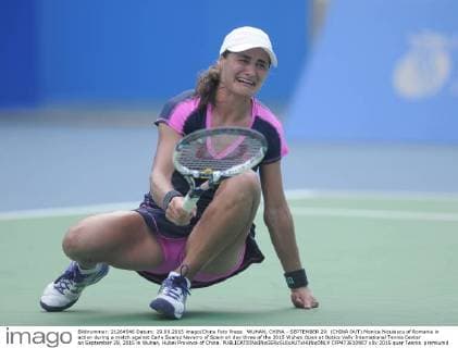 WUHAN, CHINA - SEPTEMBER 29: (CHINA OUT) Monica Niculescu of Romania in action during a match against Carla Suarez Navarro of Spain on day three of the 2015 Wuhan Open at Optics Vally International Tennis Center on September 29, 2015 in Wuhan, Hubei Province of China.  CFP473610907 