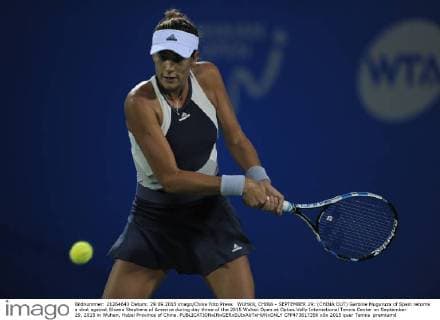 WUHAN, CHINA - SEPTEMBER 29: (CHINA OUT) Garbine Muguruza of Spain returns a shot against Sloane Stephens of America during day three of the 2015 Wuhan Open at Optics Vally International Tennis Center on September 29, 2015 in Wuhan, Hubei Province of China.  CFP473617356 
