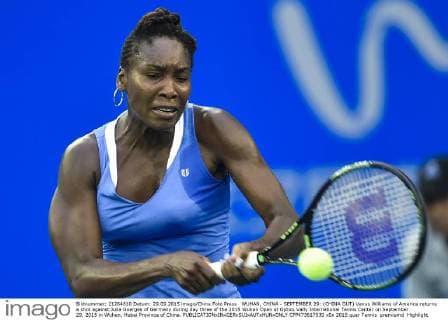 WUHAN, CHINA - SEPTEMBER 29: (CHINA OUT) Venus Williams of America returns a shot against Julia Goerges of Germany during day three of the 2015 Wuhan Open at Optics Vally International Tennis Center on September 29, 2015 in Wuhan, Hubei Province of China.  CFP473617530 