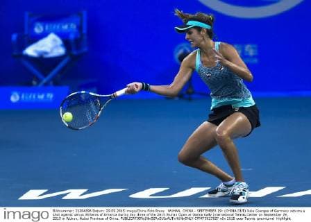 WUHAN, CHINA - SEPTEMBER 29: (CHINA OUT) Julia Goerges of Germany returns a shot against Venus Williams of America during day three of the 2015 Wuhan Open at Optics Vally International Tennis Center on September 29, 2015 in Wuhan, Hubei Province of China.  CFP473617527 