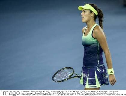 (150930) -- WUHAN, Sept. 30, 2015 -- Ana Ivanovic of Serbia reacts during the third round match againt Garbine Muguruza of Spain at 2015 WTA Tennis Damen Wuhan Open Tennis Tournament in Wuhan, capital of central China s Hubei Province, Sept. 30, 2015. Ivanovic lost 1-2. ) (SP)CHINA-WUHAN-TENNIS-WTA-WUHAN OPEN (CN) XiaoxYijiu 