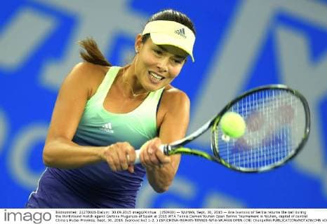 (150930) -- WUHAN, Sept. 30, 2015 -- Ana Ivanovic of Serbia returns the ball during the third round match againt Garbine Muguruza of Spain at 2015 WTA Tennis Damen Wuhan Open Tennis Tournament in Wuhan, capital of central China s Hubei Province, Sept. 30, 2015. Ivanovic lost 1-2. ) (SP)CHINA-WUHAN-TENNIS-WTA-WUHAN OPEN (CN) ChengxMin 