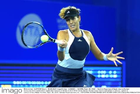 (150930) -- WUHAN, Sept. 30, 2015 -- Garbine Muguruza of Spain returns the ball during the third round match againt Ana Ivanovic of Serbia at 2015 WTA Tennis Damen Wuhan Open Tennis Tournament in Wuhan, capital of central China s Hubei Province, Sept. 30, 2015. Garbine Muguruza won 2-1. ) (SP)CHINA-WUHAN-TENNIS-WTA-WUHAN OPEN (CN) ChengxMin 