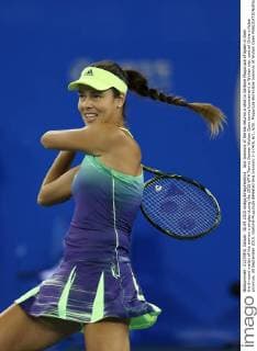 Ana Ivanovic of Serbia returns a shot to Garbine Muguruza of Spain in their third-round match of the women s singles during the 2015 WTA Tennis Damen Wuhan Open tennis tournament in Wuhan city, central China s Hubei province, 30 September 2015. Garbine Muguruza defeated Ana Ivanovic 2-1 (4 6, 6 1, 6 0). Muguruza eliminates Ivanovic at Wuhan Open  pbu338844_46