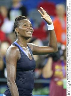 Venus Williams of the United States reacts after defeating Carla Suarez Navarro of Spain in their third-round match of the women s singles during the 2015 WTA Tennis Damen Wuhan Open tennis tournament in Wuhan city, central China s Hubei province, 30 September 2015. Venus Williams beat Carla Suarez Navarro of Spain 6-3, 6-4 on Wednesday (30 September 2015) to advance to the quarterfinals of the Wuhan Open. A day after earning her 700th victory, Williams hit five aces and saved three of four break points to dispatch the seventh-seeded Navarro in 1 hour, 29 minutes. Williams, who is a seven-time major champion and won her last Grand Slam title at Wimbledon in 2008, improved to 3-3 in her head-to-head against Navarro. She will next face the winner of the match between top-seeded Simona Halep and Johanna Konta being played later Wednesday. Venus Williams beats Navarro to advance at Wuhan Open  20150930_63861